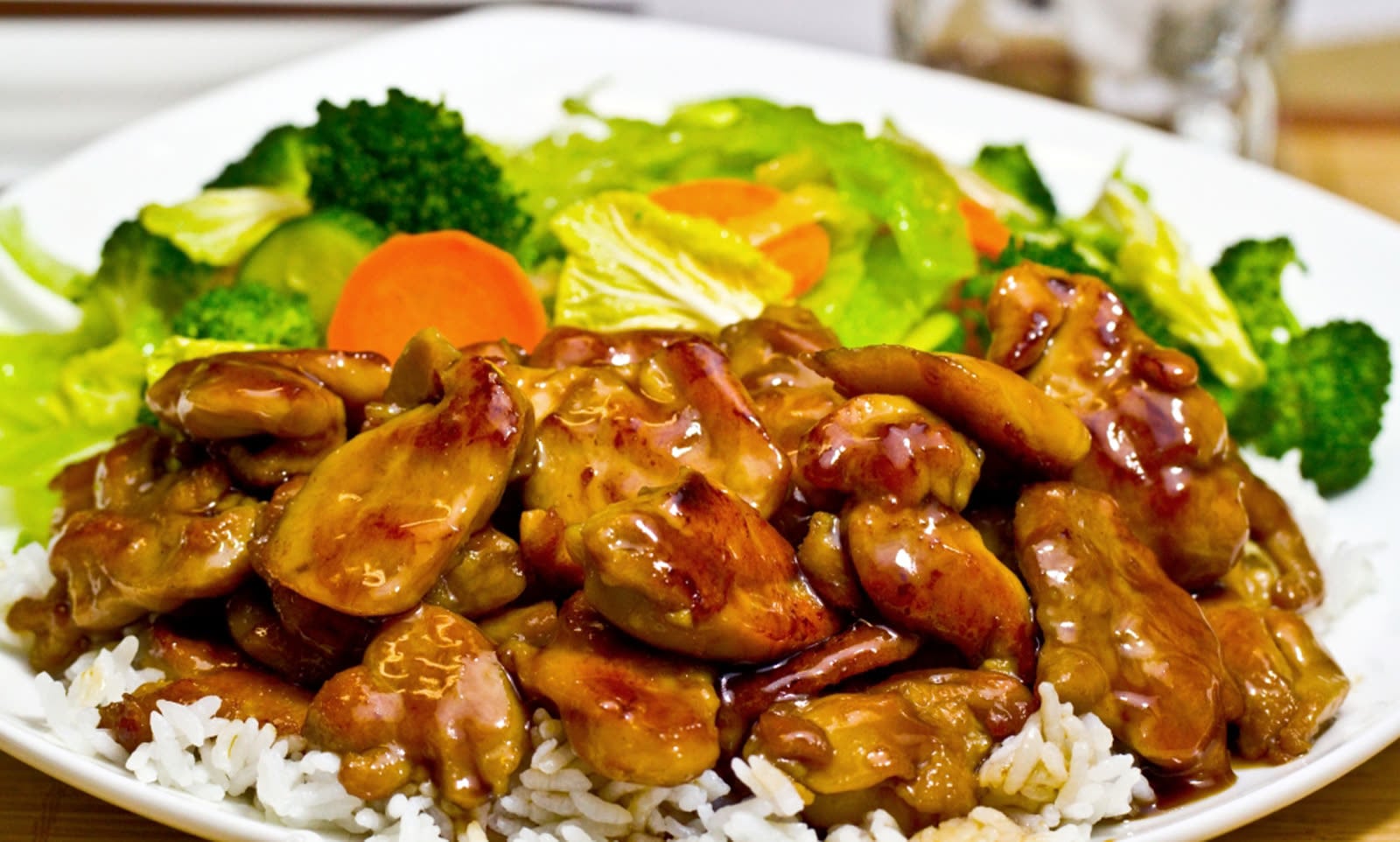 Chicken teriyaki over rice with steamed vegetables